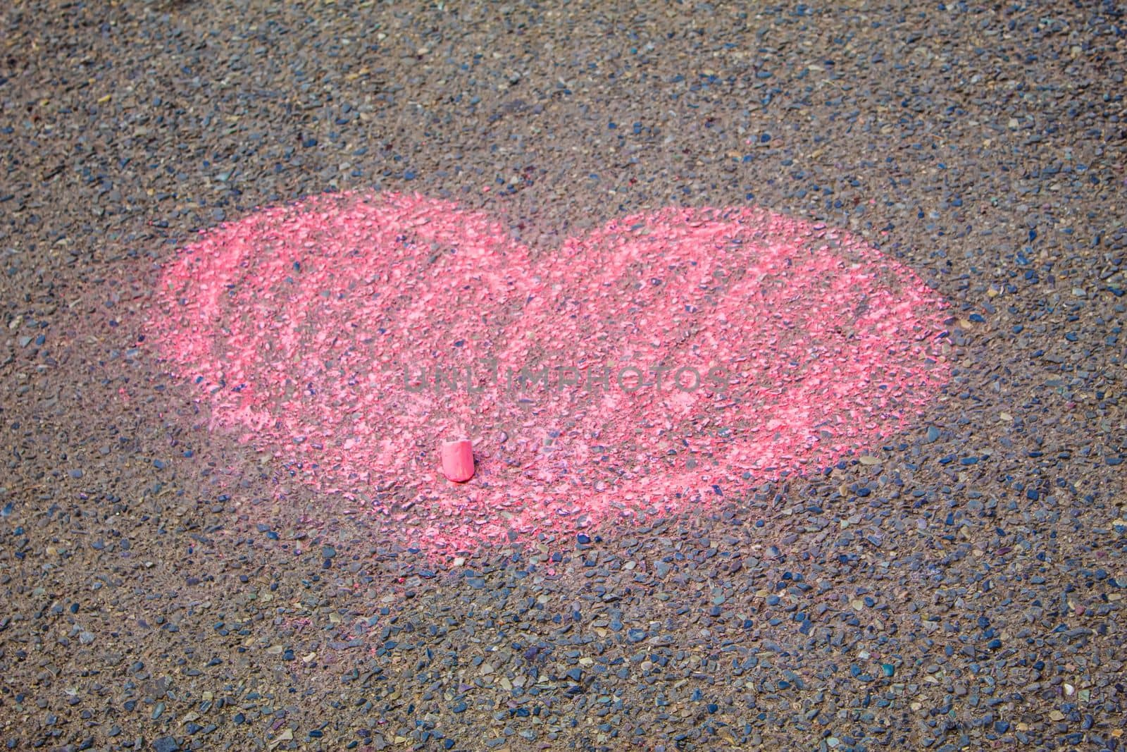 Children's drawings on the asphalt with chalk. Selective focus. by mila1784