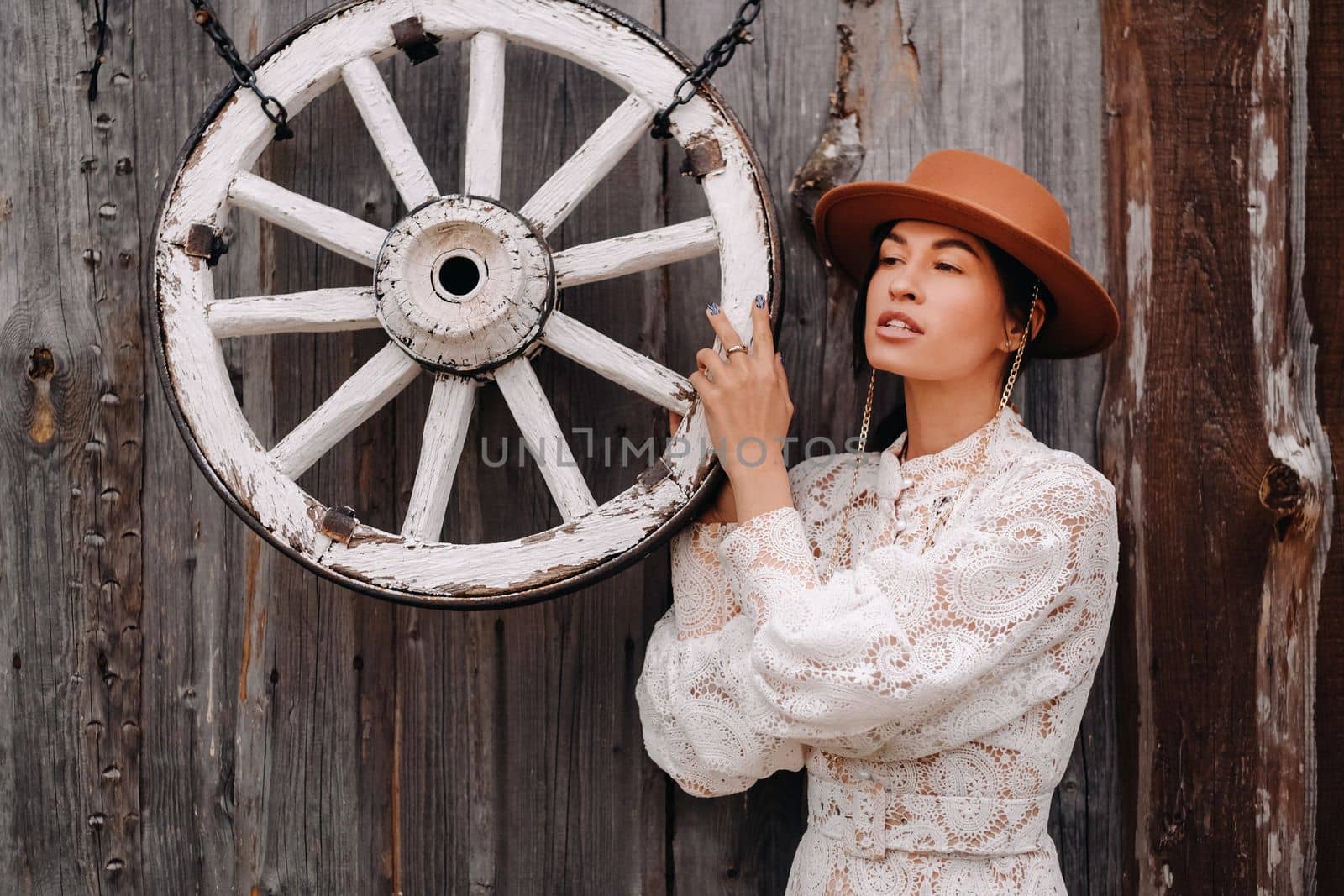 Beautiful girl in vintage lace dress and hat at the ranch by Lobachad