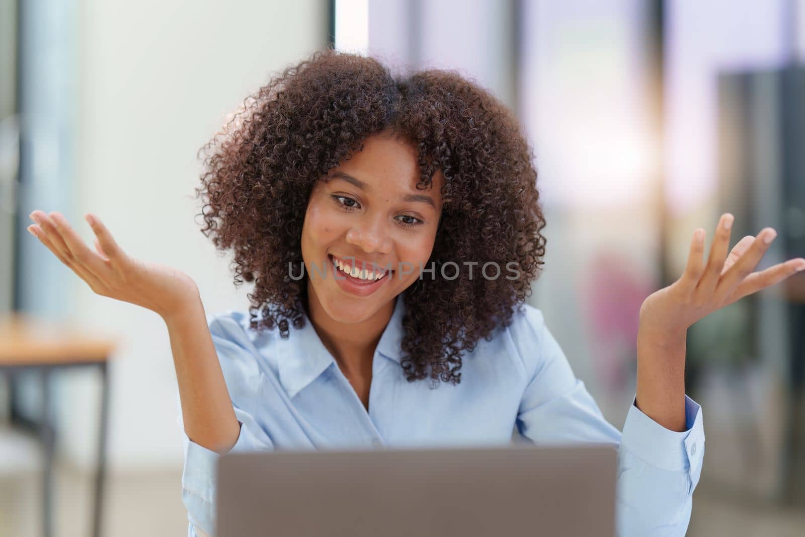 Attractive black businesswoman using laptop video conference call, business colleagues. Communicating with team.