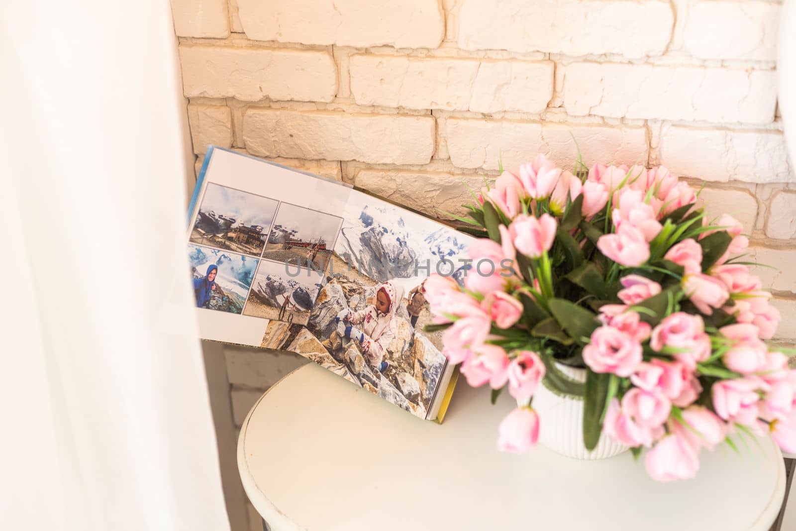 Photoalbum with pink flowers, photobooks.