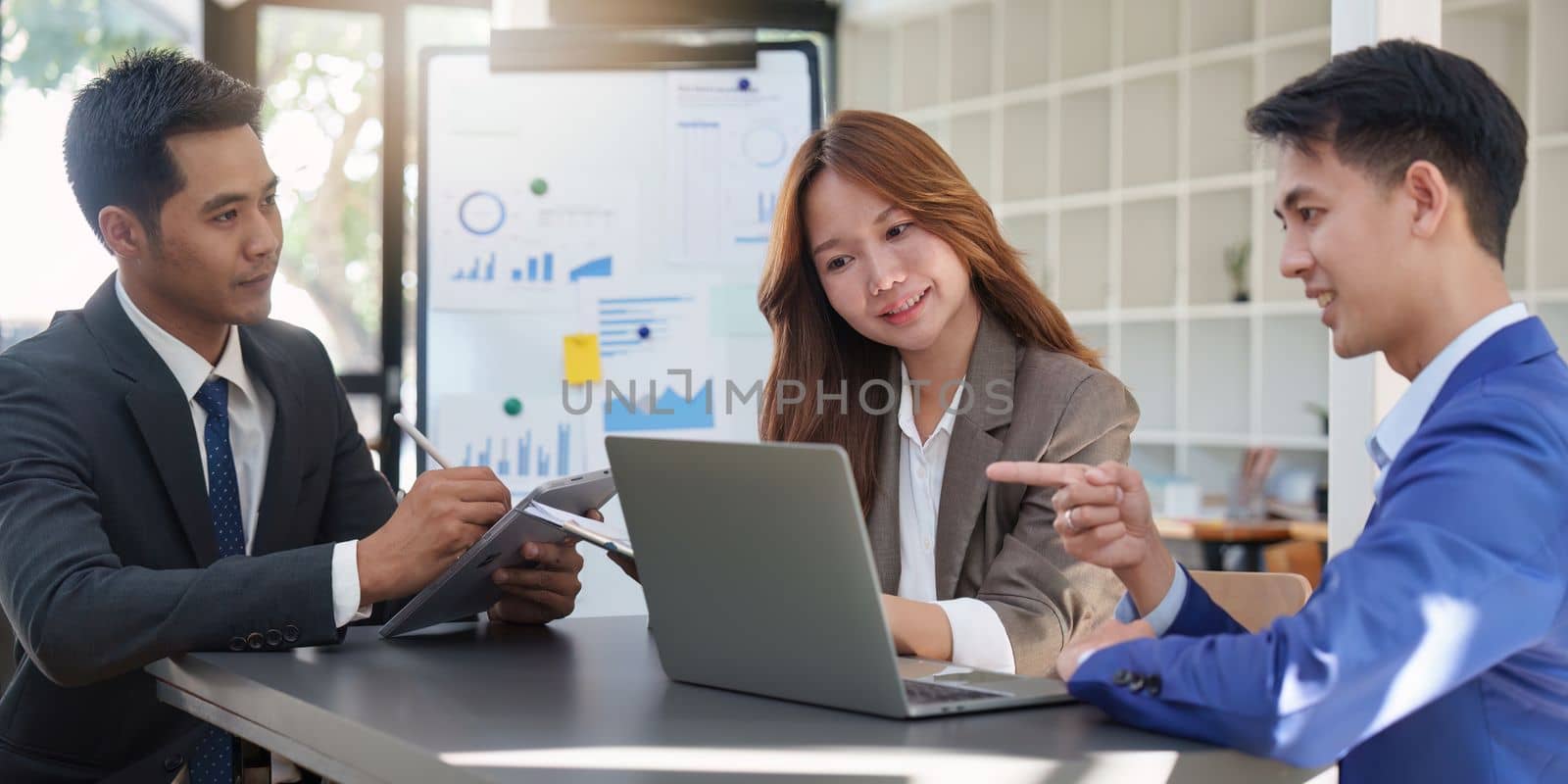 Financial analyst analyzes business people investment consultant analyzing company financial report working with documents graphs. Stock Market Tax Fund Finance concept.