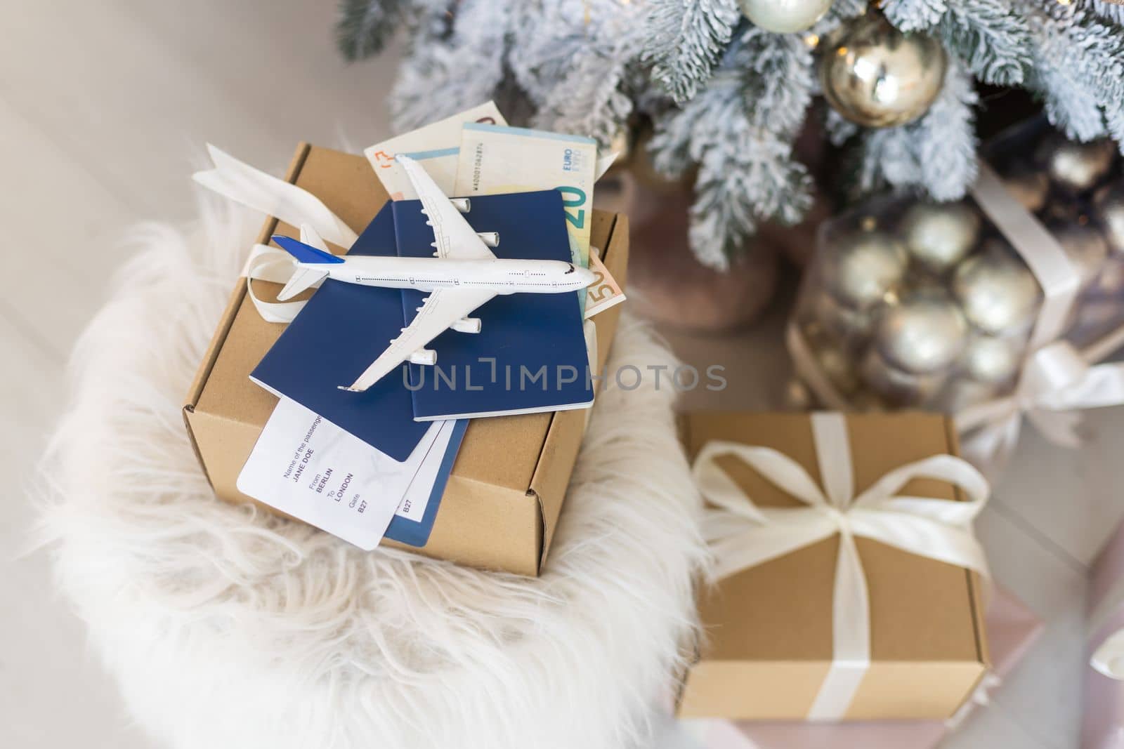 Christmas background with airplane. Travel concept for the holidays. by Andelov13