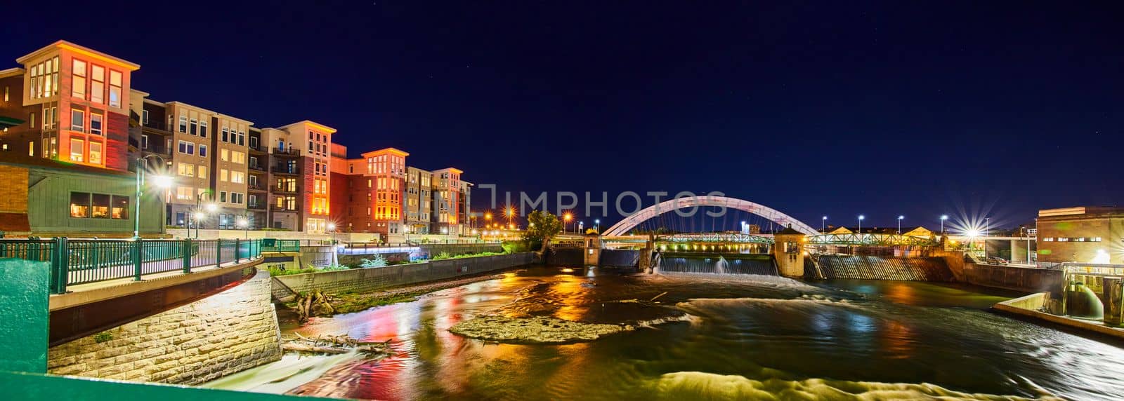 Image of Rochester New York at night of river and bridge