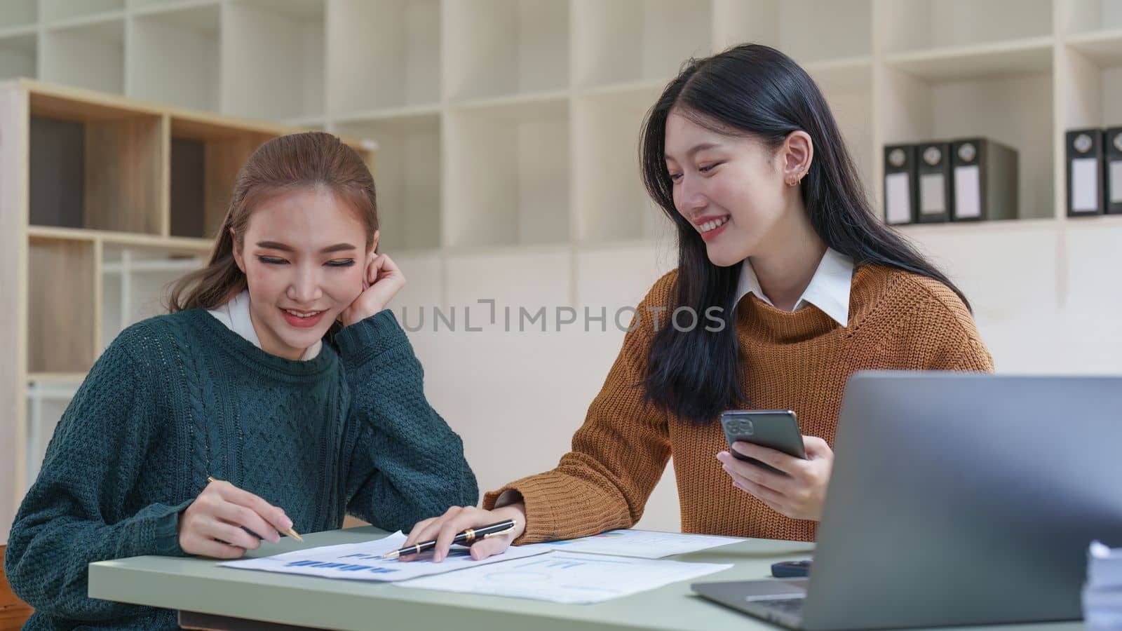 Asian business advisor meeting to discuss and analyze and the situation on the financial report in the meeting room. Fund Investment and accounting concept.