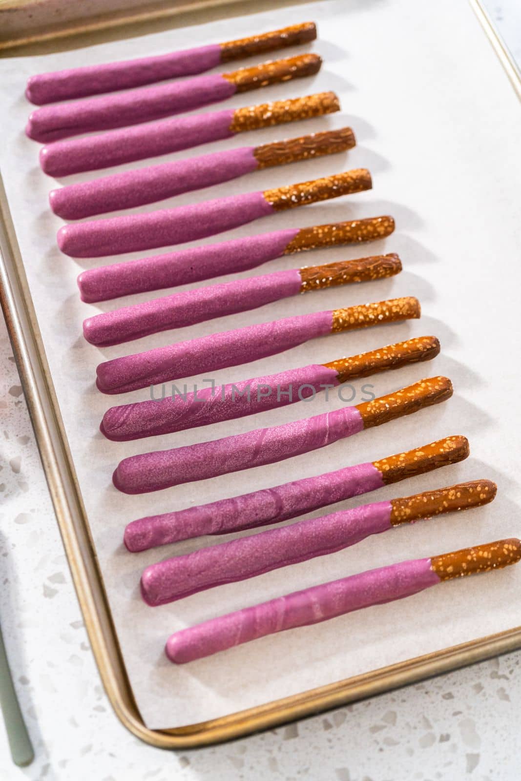 Halloween chocolate-covered pretzel rods by arinahabich