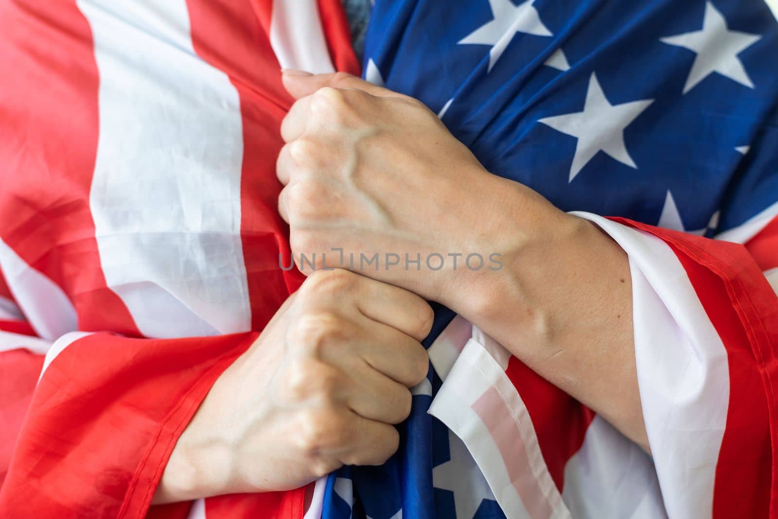 female hands on usa flag.