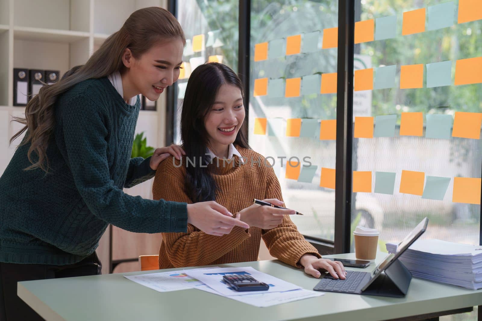 Asian business advisor meeting to discuss and analyze and the situation on the financial report in the meeting room. Fund Investment and accounting concept.