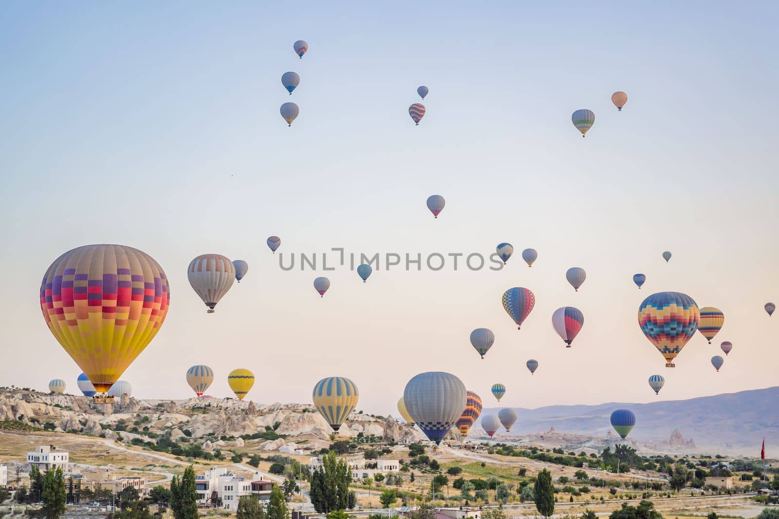 Colorful hot air balloon flying over Cappadocia, Turkey.