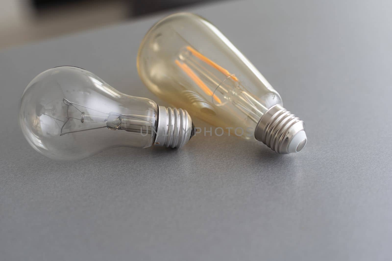 Realistic photo image of light bulbs. isolated bulbs, fluorescent bulbs, orange old generation bulb, Tungsten bulb, and white energy saving bulb.