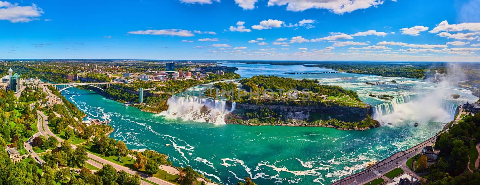 Image of Wide panorama overlook of entire Niagara Falls from Canada