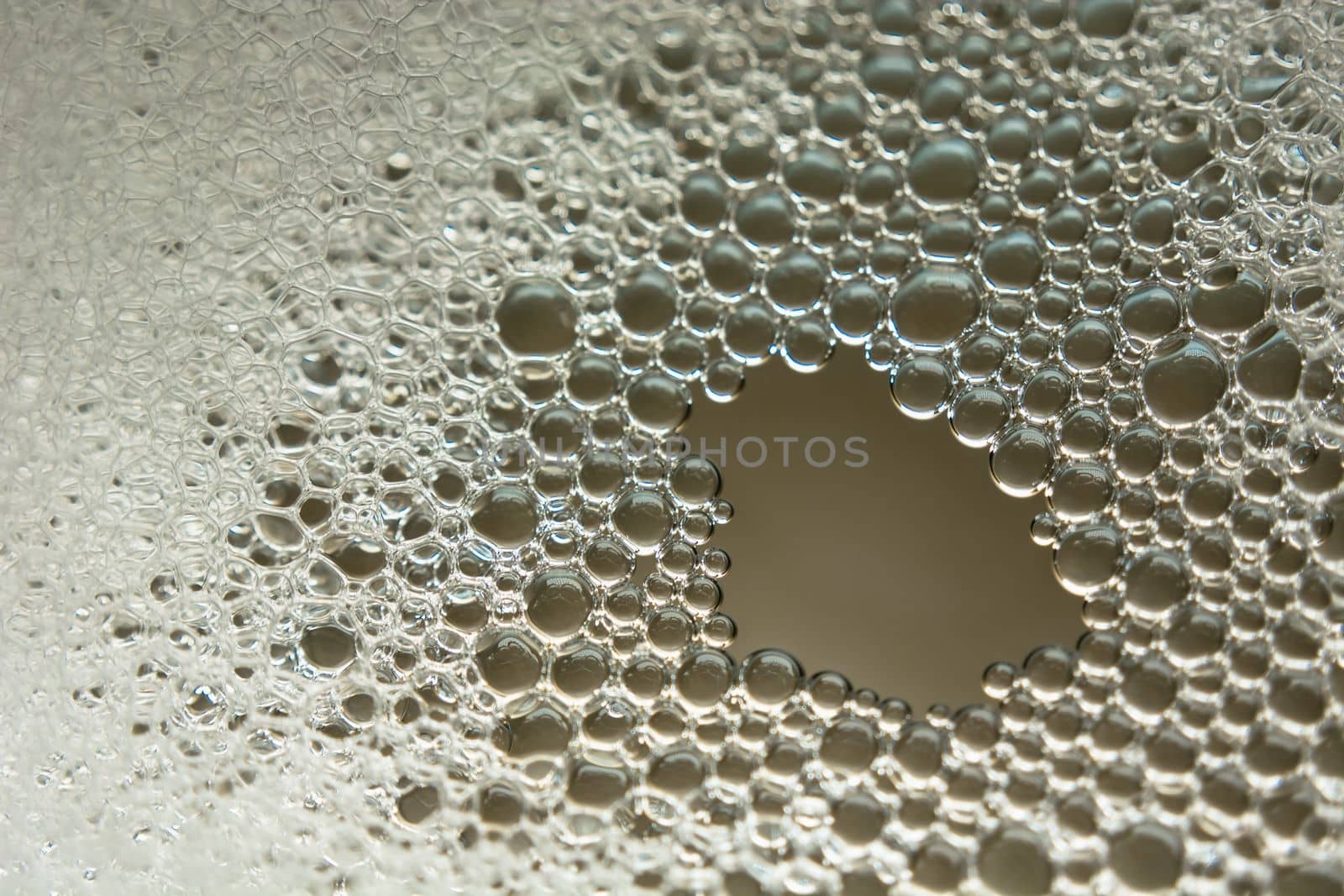 Foam bubbles on the water close up by darekb22