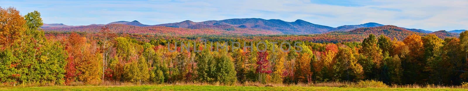 Wide panorama of stunning fall mountain landscape in New York by njproductions