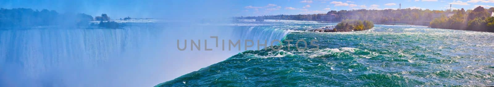 Image of Wide panoramic view of Horseshoe Falls up close on edge with misty falls in Niagara Falls