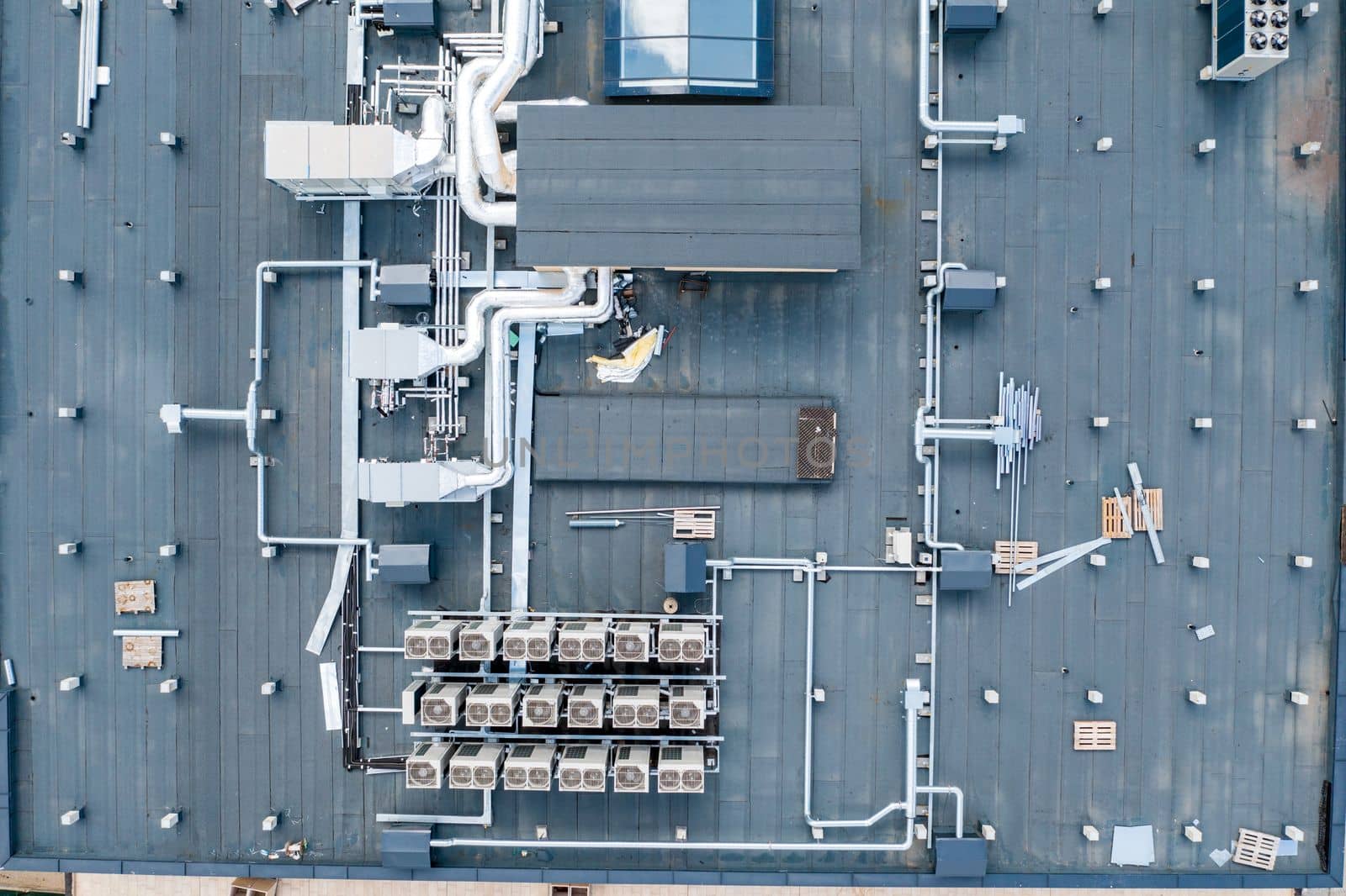 air ventilation flow system on the roof of the building. vent pipe fan HVAC. 