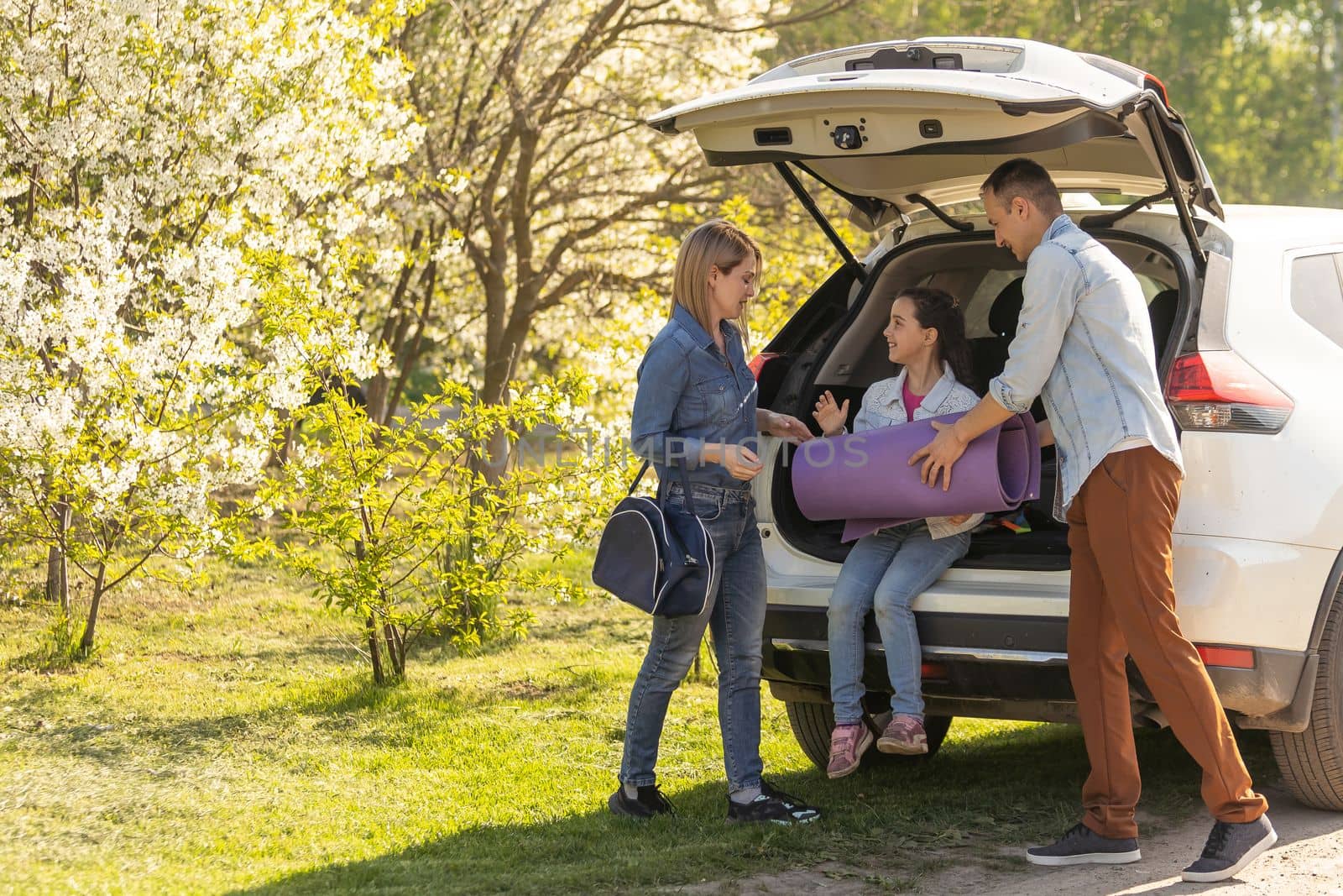 asian muslim family with suitcase prepare to go. concept of family travelling by Andelov13