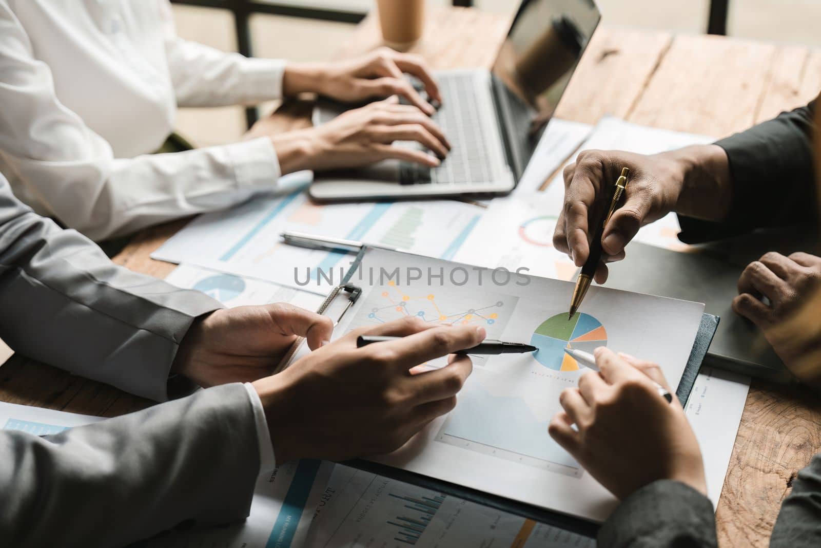 Startup business meeting to analyze and discuss the situation on the financial report in the meeting room. Investment Consultant, Financial advisor and accounting concept