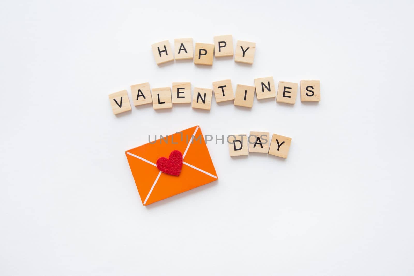 Love letter, red heart, wood lettering Happy Valentine's Day. Valentine's Day celebration concept