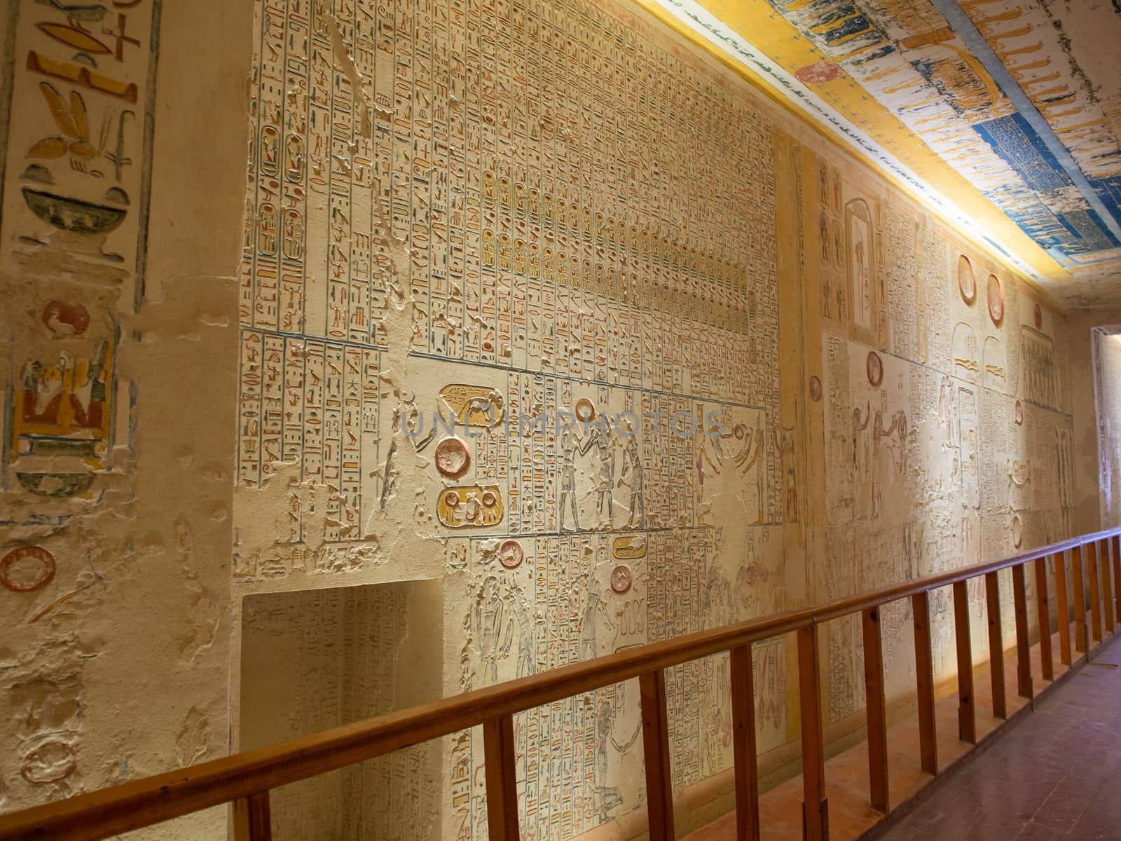 Hieroglypic carvings on corridor wall in the ancient Egyptian tomb of Ramses V and VI in Luxor Valley of the Kings