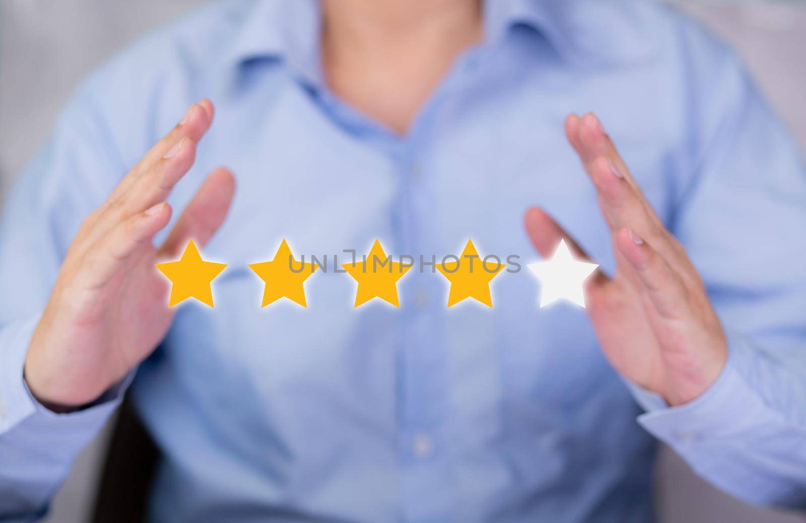 Customer business man holding star icon symbol for vote score review and feedback with quality and satisfaction, success of digital marketing with result excellent for ranking of service.