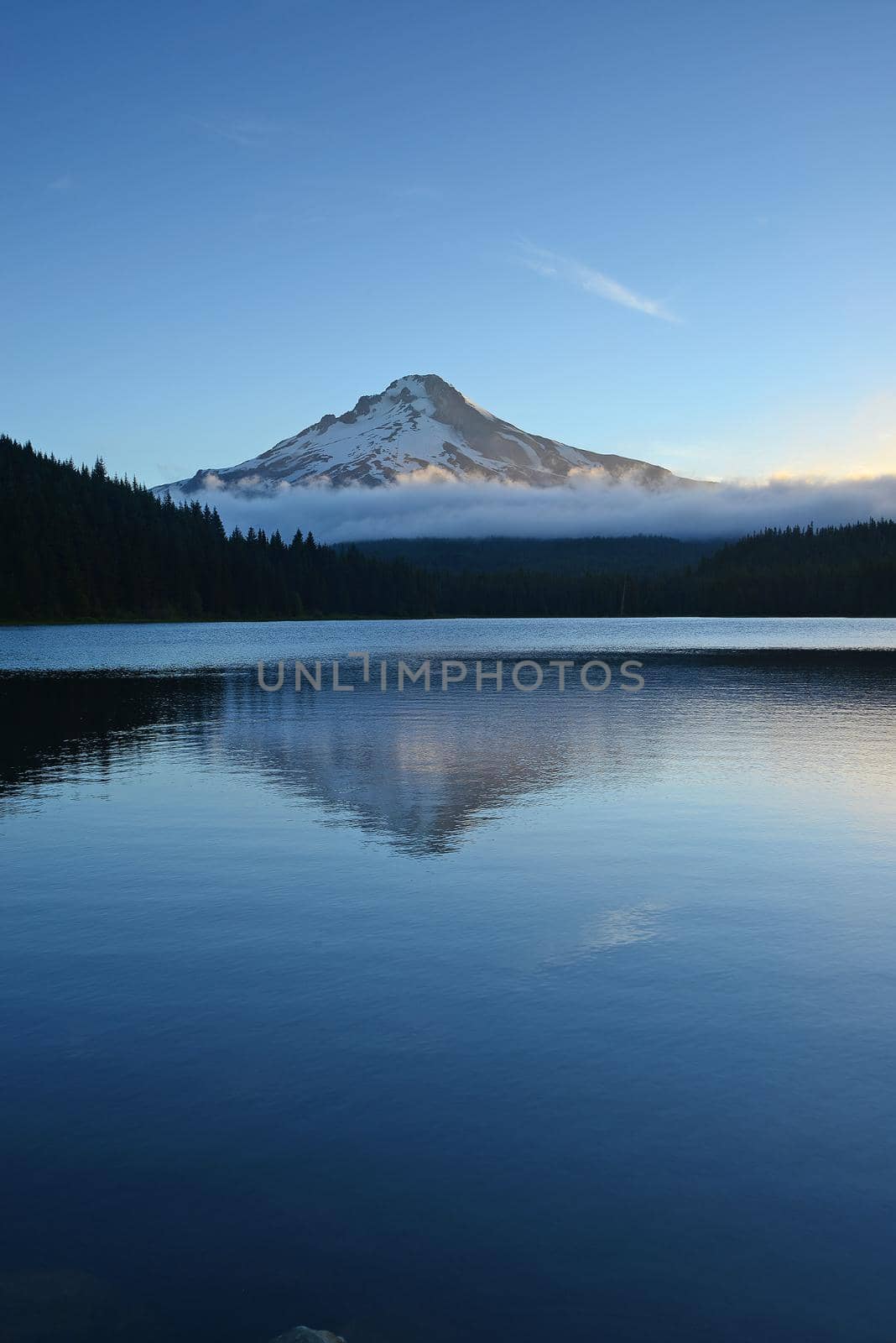 Morning sunlight at Mount Hood in Oregon, with reflection