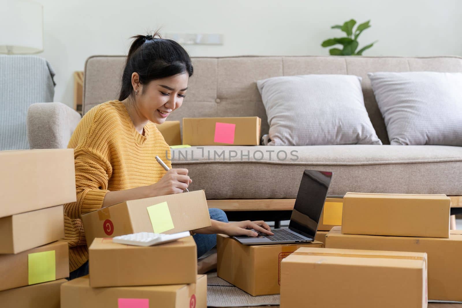 Startup small business entrepreneur online SME or freelance woman working at home concept, Young Asian small business owner at home office, online marketing packaging and delivery, SME concept.