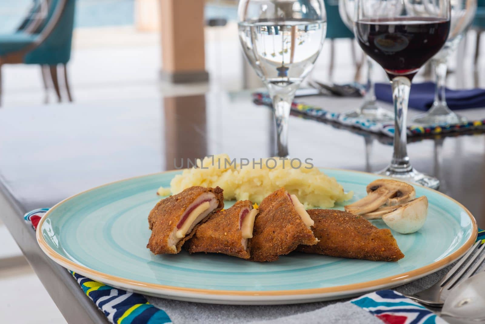 Stuffed chicken panne a la carte meal with mashed potato by paulvinten