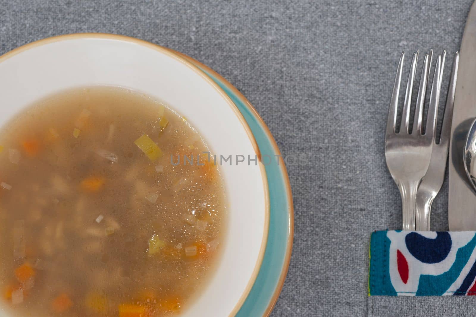 Vegetable soup a la carte meal in a bowl with cutlery by paulvinten