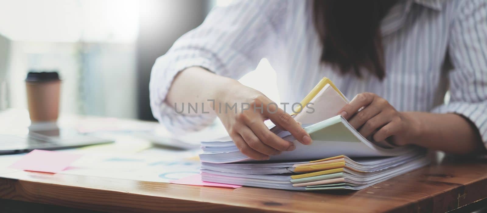 Business Documents, Auditor businesswoman checking searching document legal prepare paperwork or report for analysis TAX time,accountant Documents data contract partner deal in workplace office.