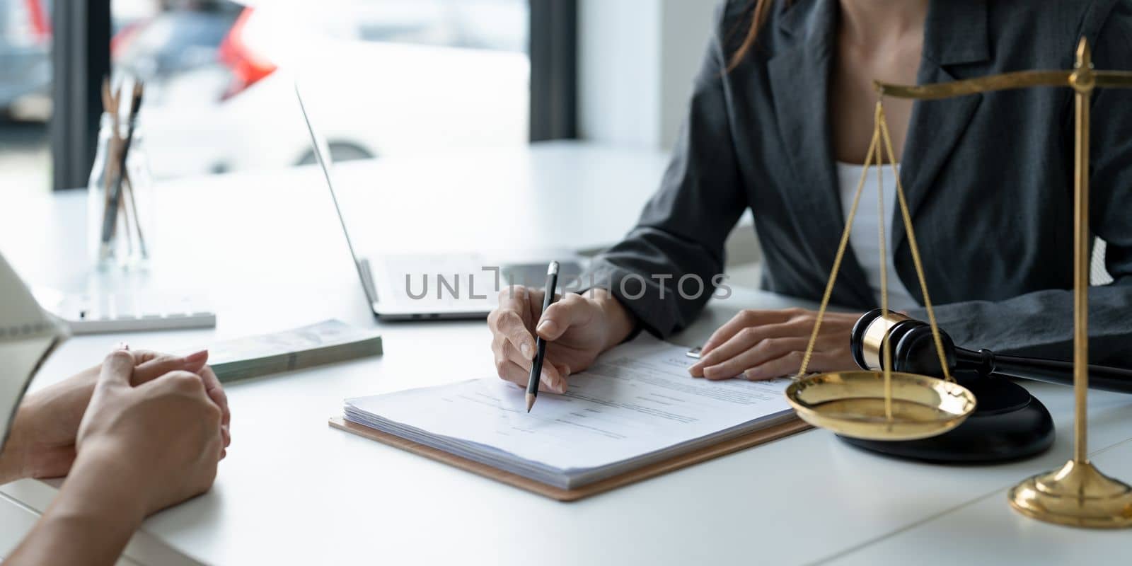 Businesswoman and lawyer discuss the contract document. Treaty of the law. Sign a contract business