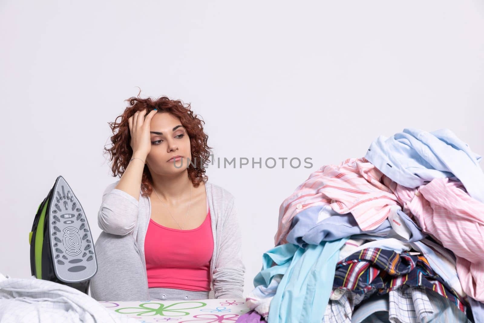 Today a dozen men's shirts went from the laundry to the ironing board. The girl is completely deflated and is offended at the whole world.