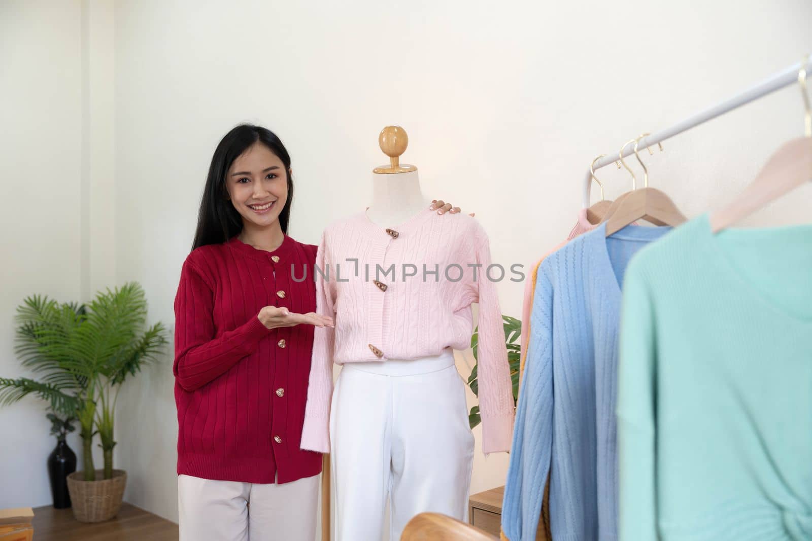 Portrait of Starting small businesses SME owners, Asian woman check online orders Selling products working with boxs freelance work at home office, sme business online small medium enterprise..