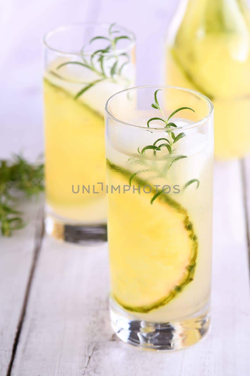 Glass of lemonade with pineapple by Apolonia
