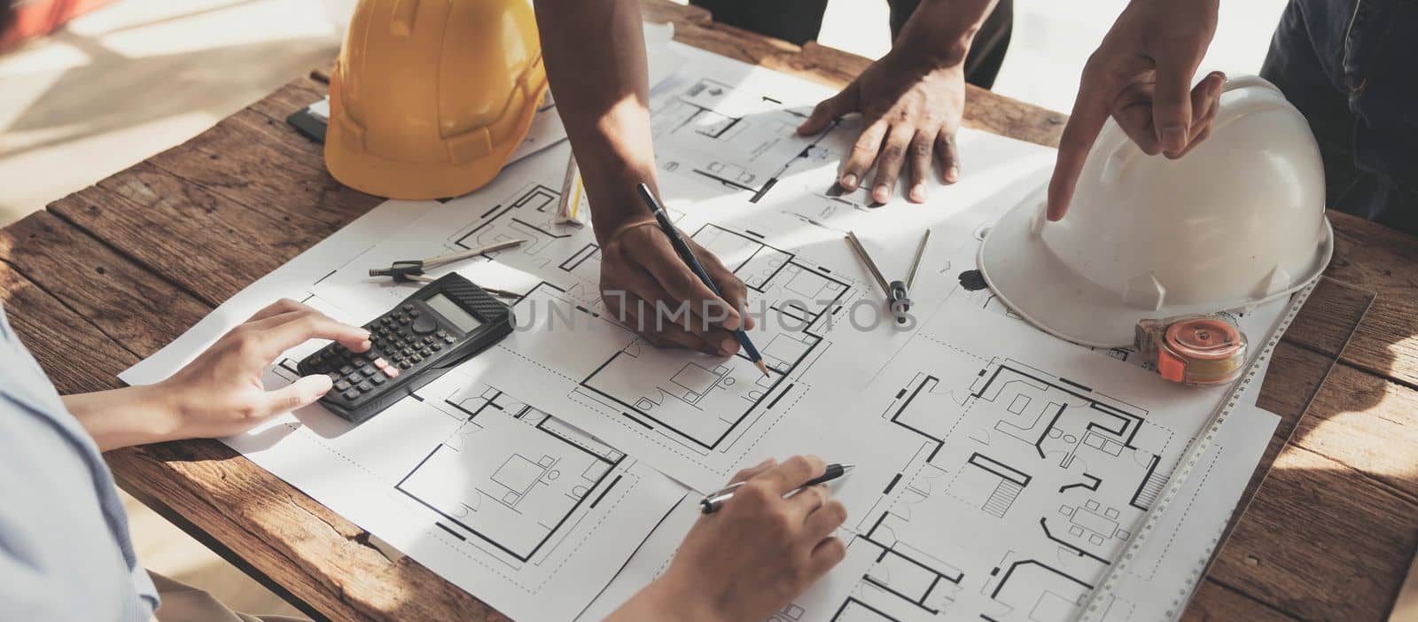 Engineer Teamwork Meeting, Drawing working on blueprint meeting for project working with partner on model building and engineering tools in working site, Construction and structure concept..