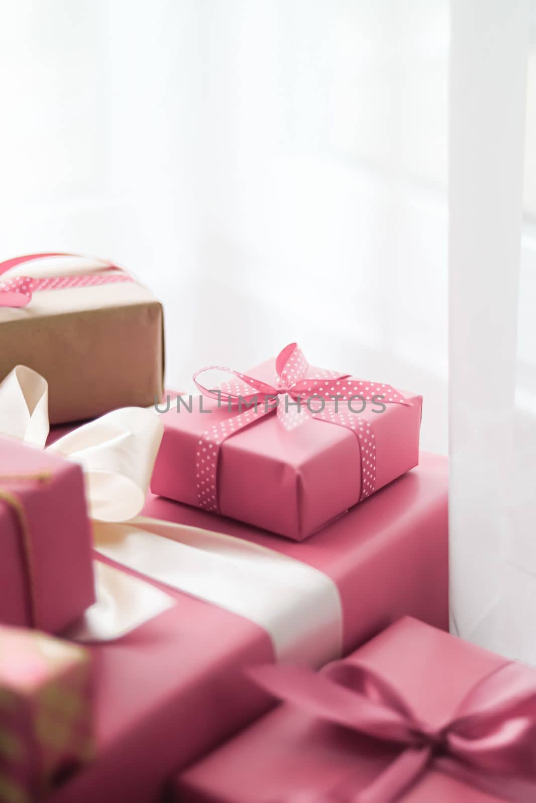 Holiday gifts and wrapped luxury presents, pink gift boxes as surprise present for birthday, Christmas, New Year, Valentines Day, boxing day, wedding and holidays shopping or beauty box delivery concept