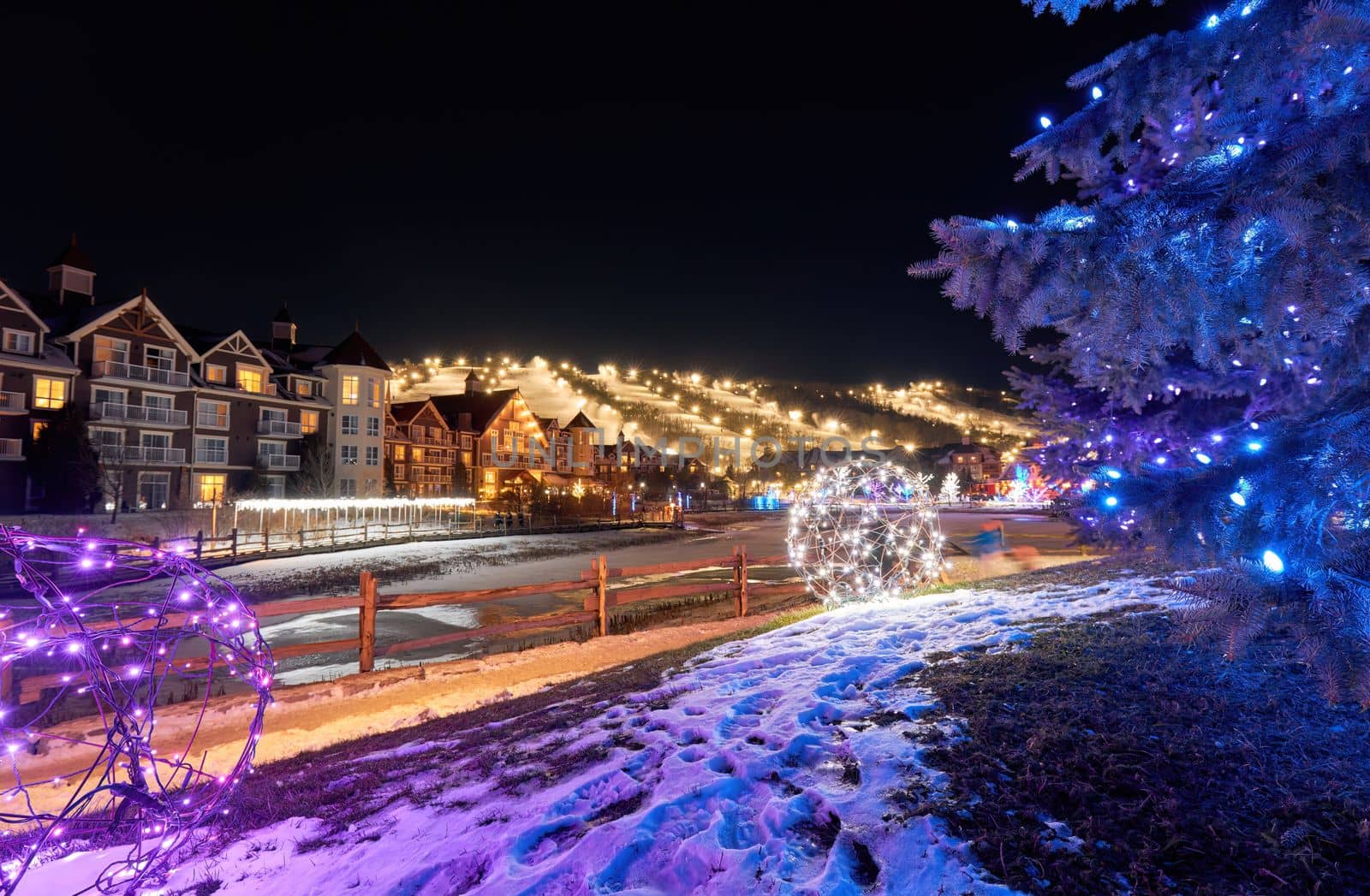 Blue Mountain Village in winter Lit up with Christmas Lights at Night by markvandam