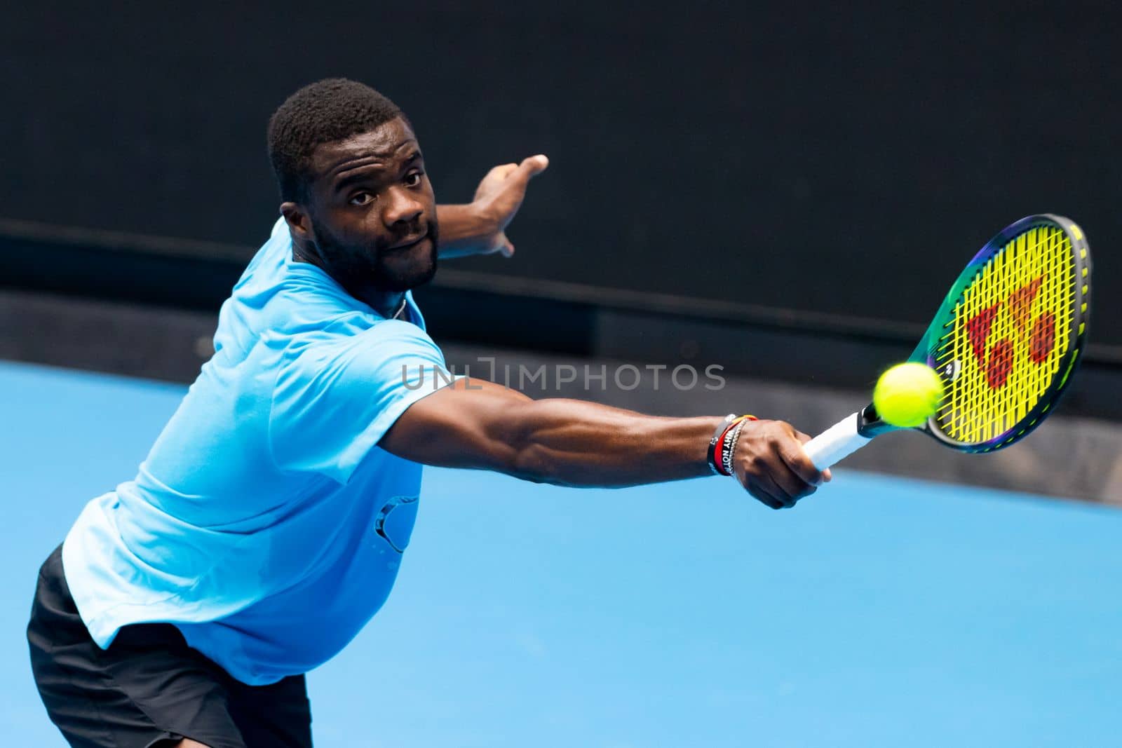 MELBOURNE, AUSTRALIA - JANUARY 13: Frances Tiafoe (USA) practices ahead of the 2023 Australian Open at Melbourne Park on January 13, 2023 in Melbourne, Australia.