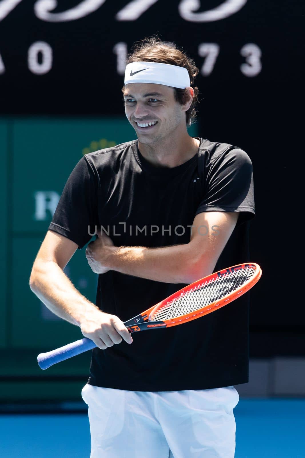 MELBOURNE, AUSTRALIA - JANUARY 13: Taylor Fritz of USA practices ahead of the 2023 Australian Open at Melbourne Park on January 13, 2023 in Melbourne, Australia.