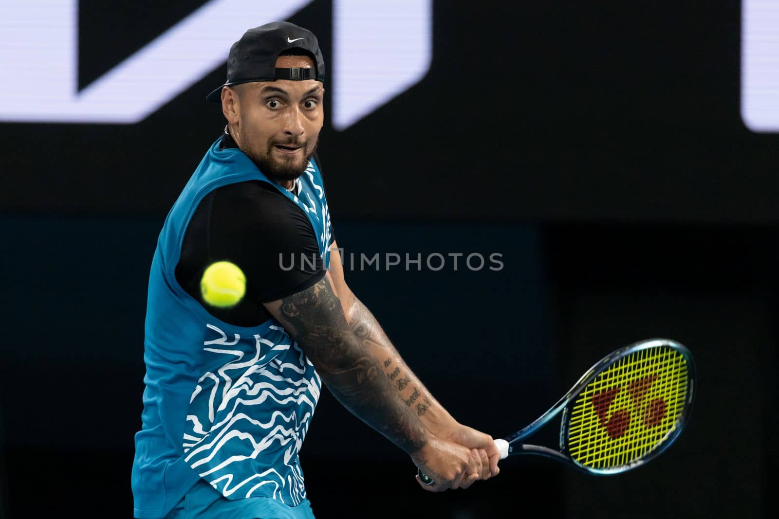 MELBOURNE, AUSTRALIA - JANUARY 13: Nick Kyrgios of Australia plays against Novak Djokovic of Serbia in an Arena Showdown charity match ahead of the 2023 Australian Open at Melbourne Park on January 13, 2023 in Melbourne, Australia.