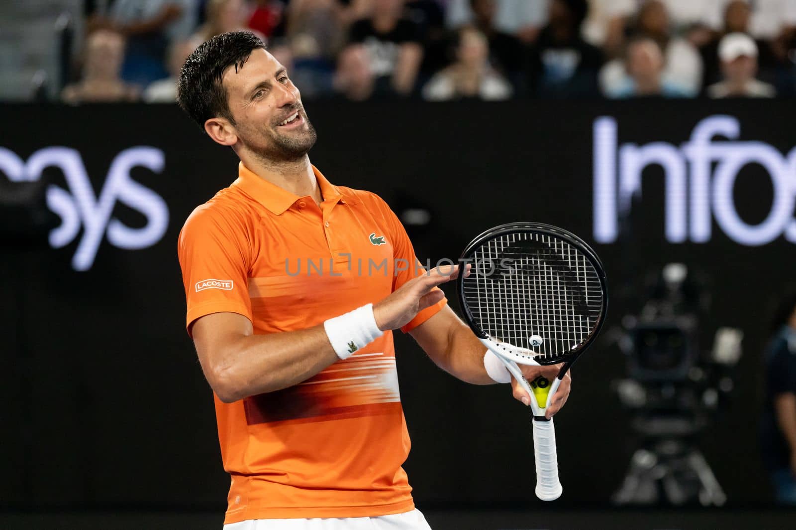 MELBOURNE, AUSTRALIA - JANUARY 13: Novak Djokovic of Serbia celebrates a point against Nick Kyrgios of Australia in an Arena Showdown charity match ahead of the 2023 Australian Open at Melbourne Park on January 13, 2023 in Melbourne, Australia.