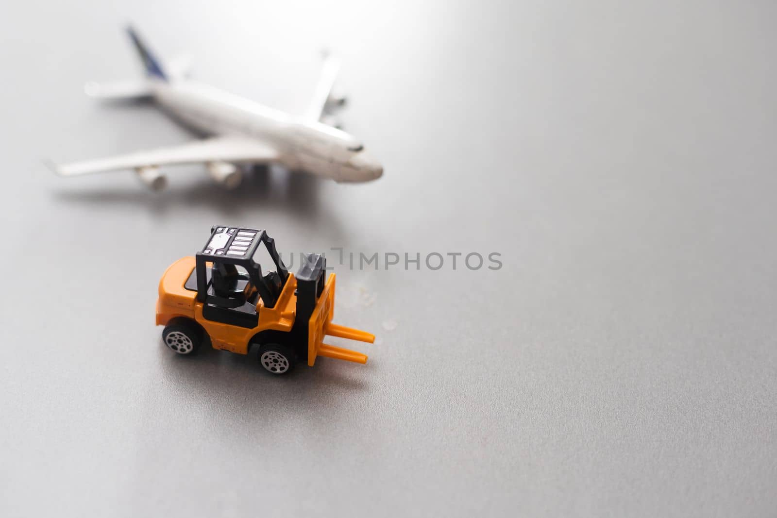 toy excavator and plane. Industry concept