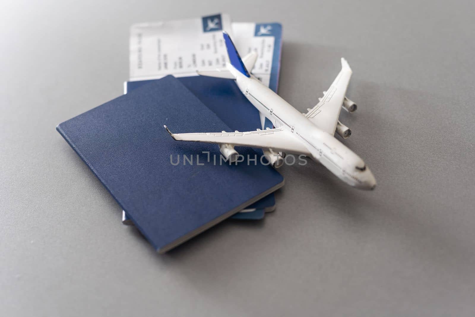 Preparation for Traveling concept, toy airplane, passport with copy space.