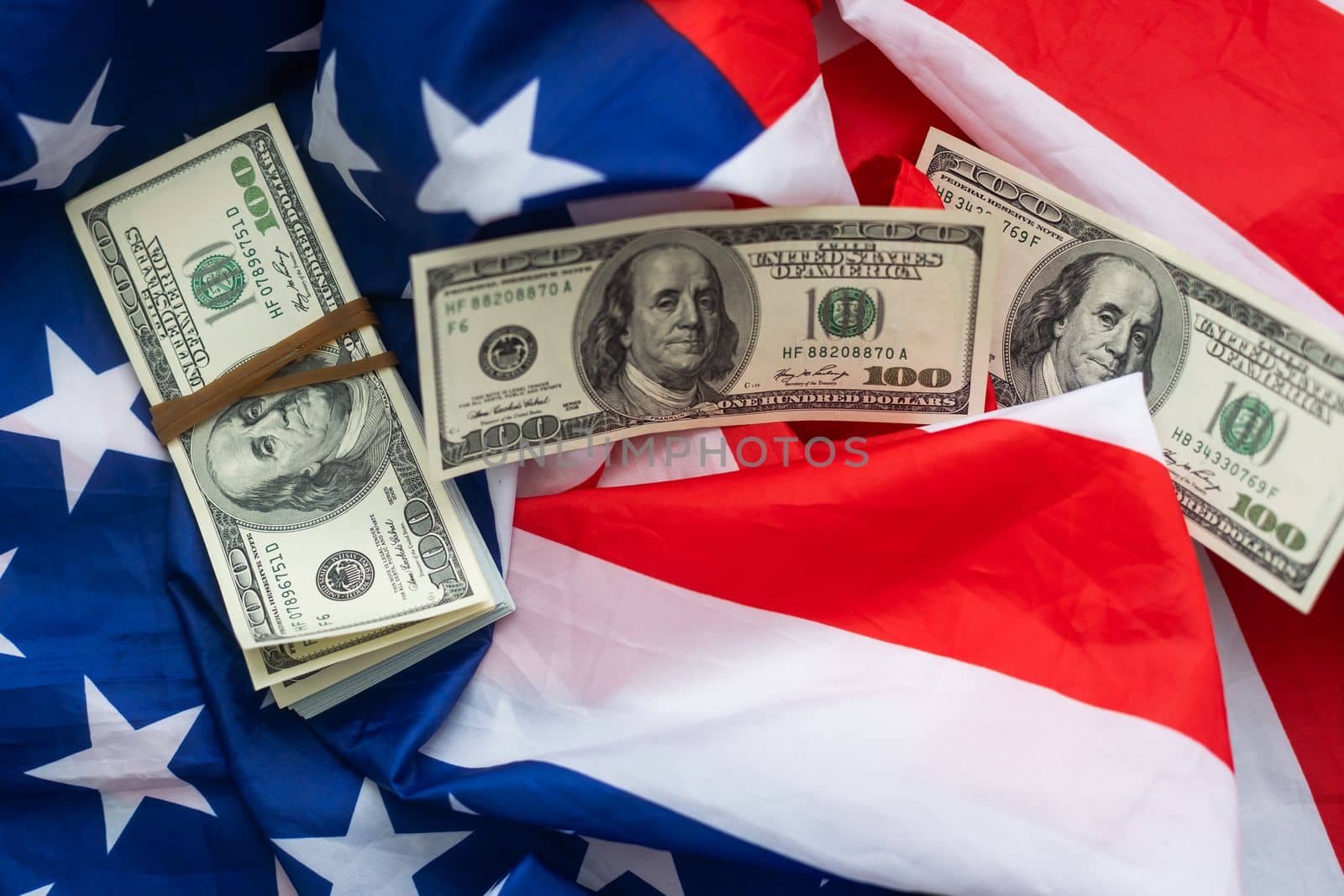 USA national flag and currency usd money banknotes. Business and finance concept.