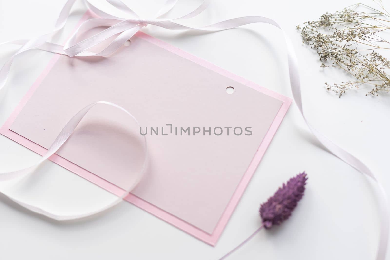 Blank paper card mockup, pastel pink card with wax flowers