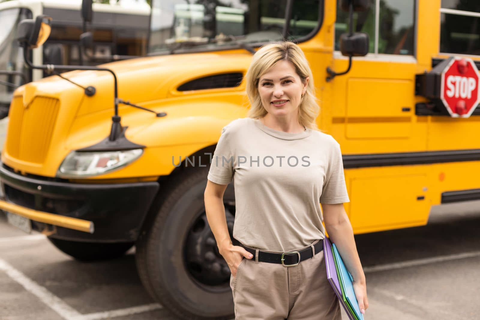 a woman near a school bus by Andelov13