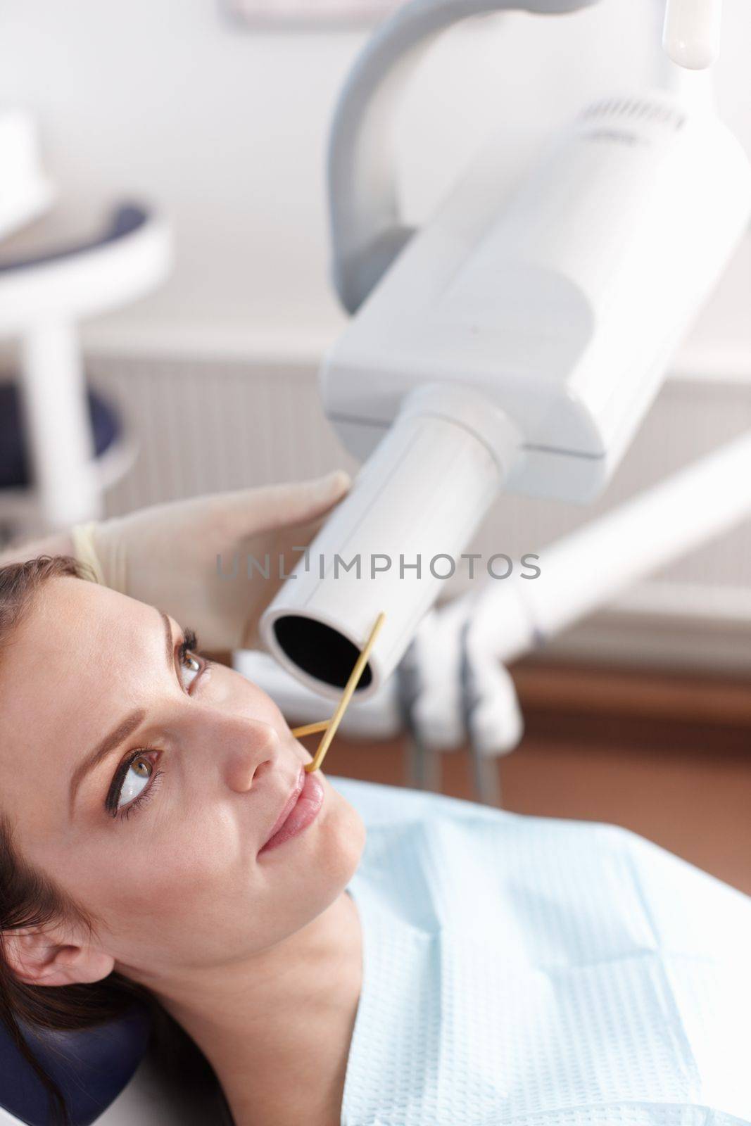 Dental patient. Portrait of female patient at dentist office for operation