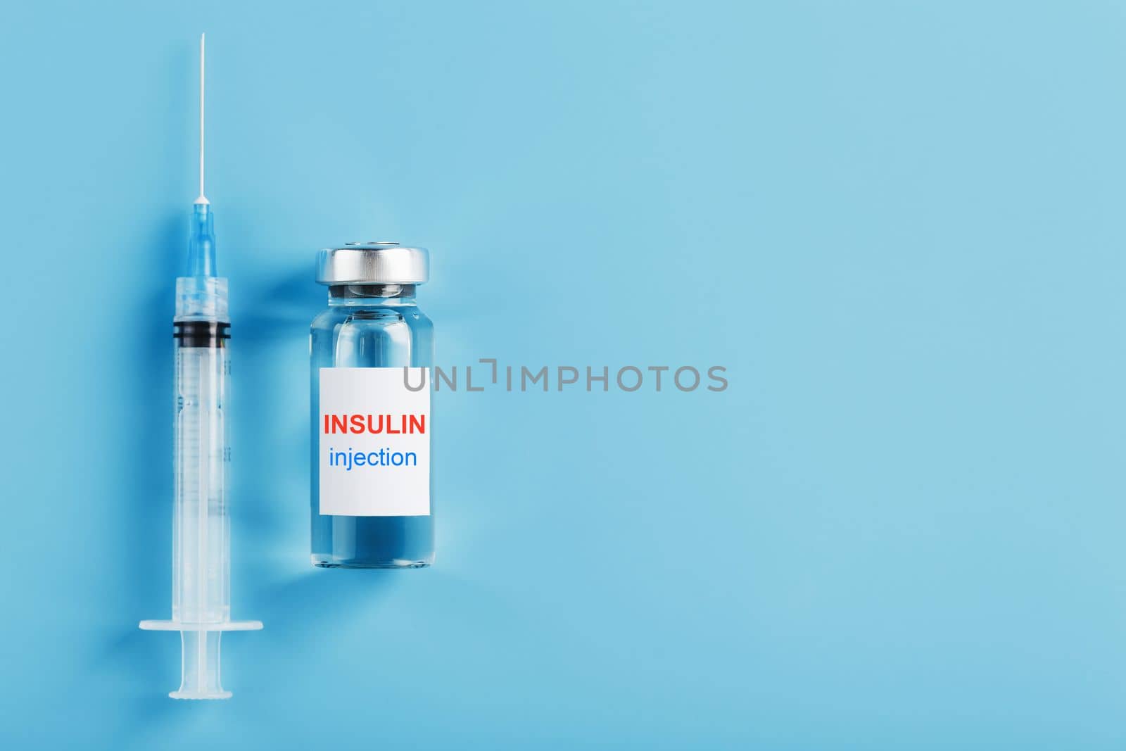 Medicine in ampoules with insulin, needles and syringes for medical subcutaneous injection by AlexGrec