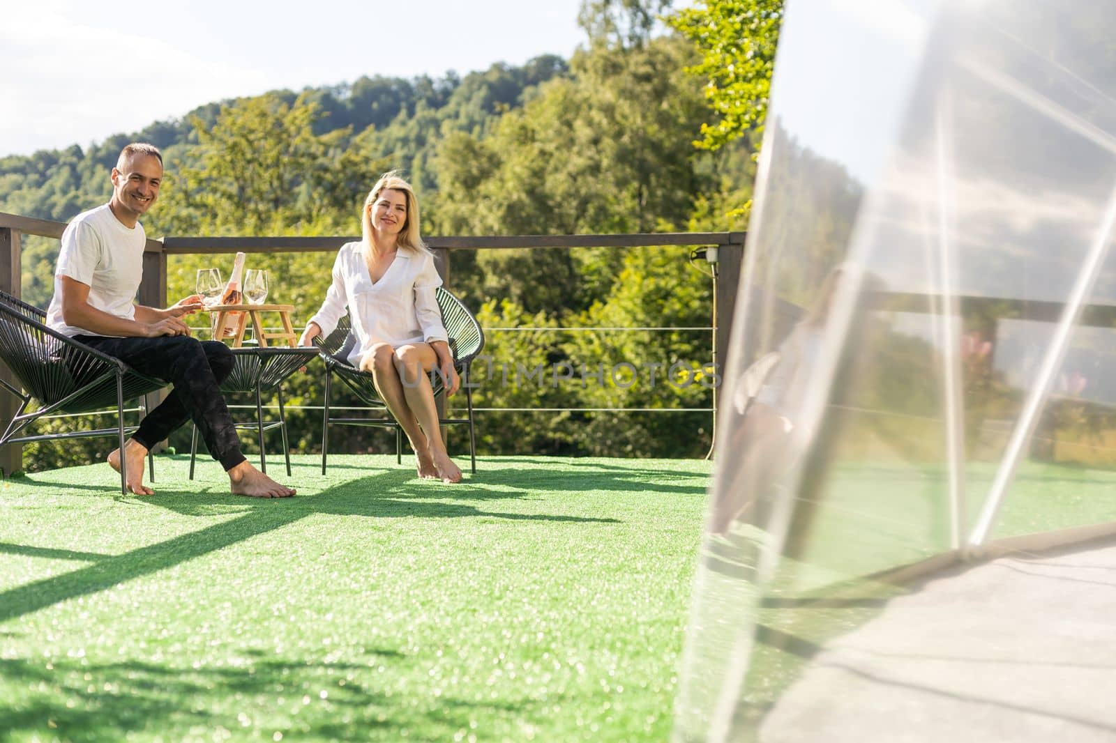 couple on the terrace in the mountains.