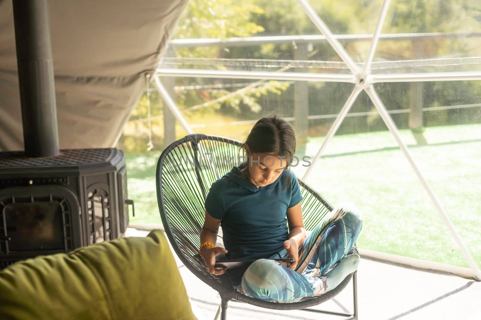 girl playing in the tablet.