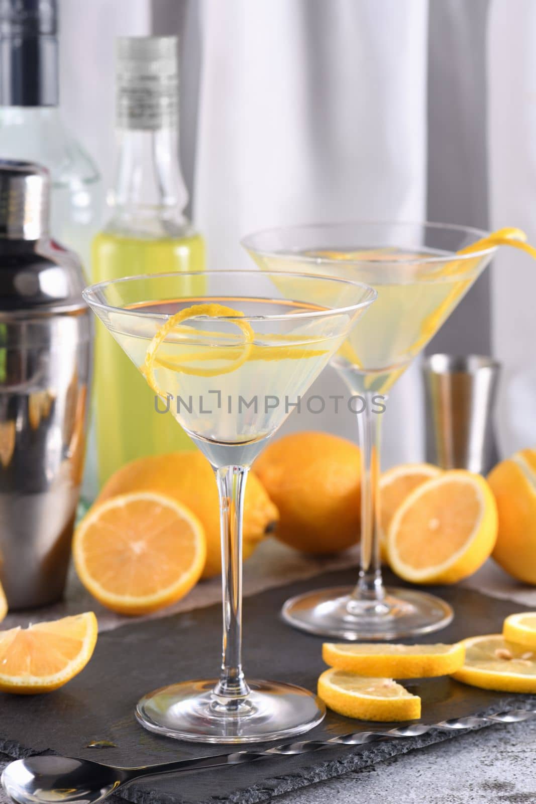 Lemon drop martini with zest offers a sophisticated twist to a cocktail. This light and savory favorite combines vodka, orange liqueur, fresh lemon juice and zest.