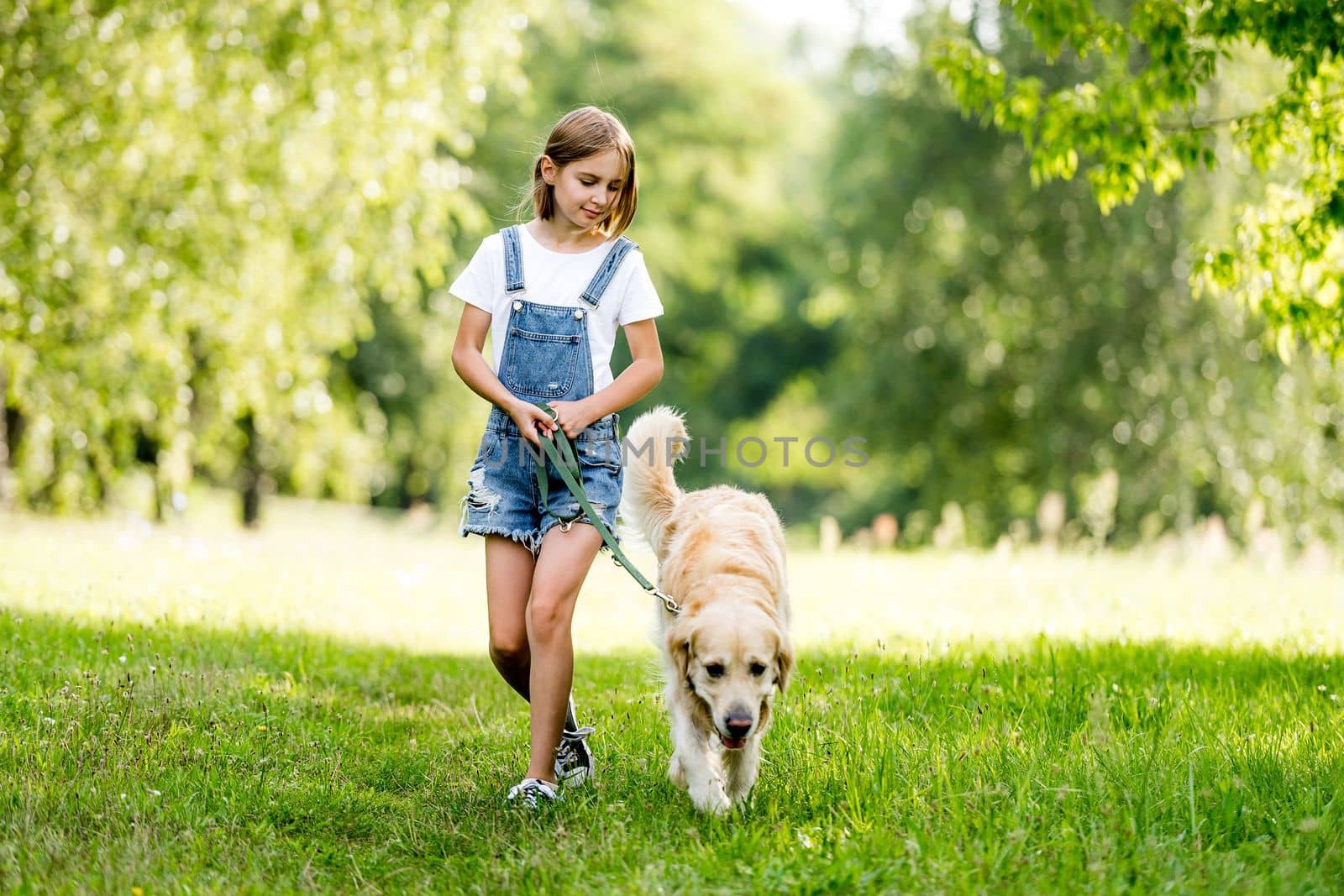 Cute little girl with lovely dog by tan4ikk1